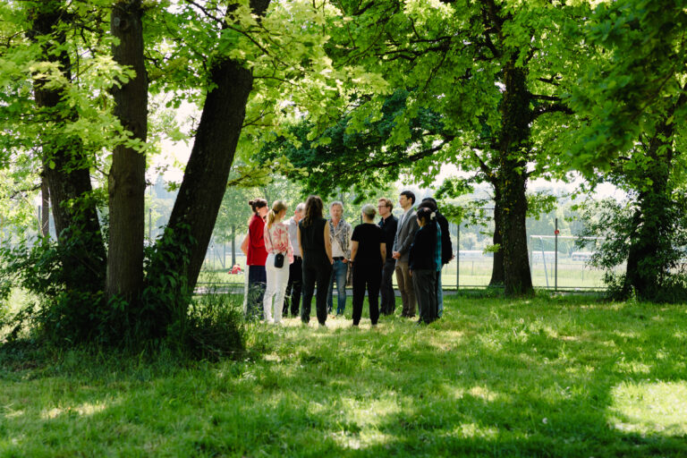 Team gathering in the outdoors for an honest conversation
